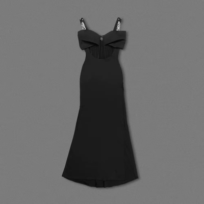 High Slit and Sheer Netting Add a Touch of Elegance to this Sexy Black Maxi Dress Perfect for a Party Look