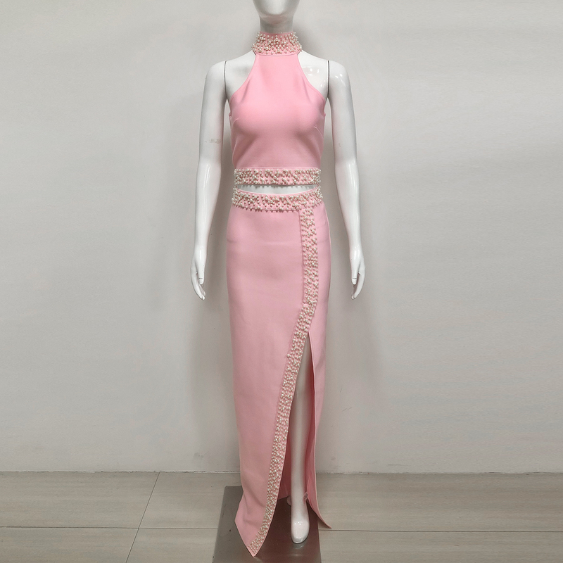 Unleash Your Inner Fashionista with this Pink Bandage Two-Piece Set featuring Pearl Details and High Slit Skirt